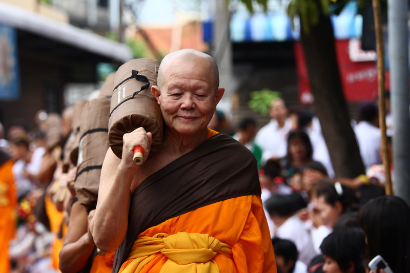 street, clothing, tradition, wat, group of people, focus on foreground, incidental people, temple, buddhists, buddhism, walk, orange, festival, gold, day
