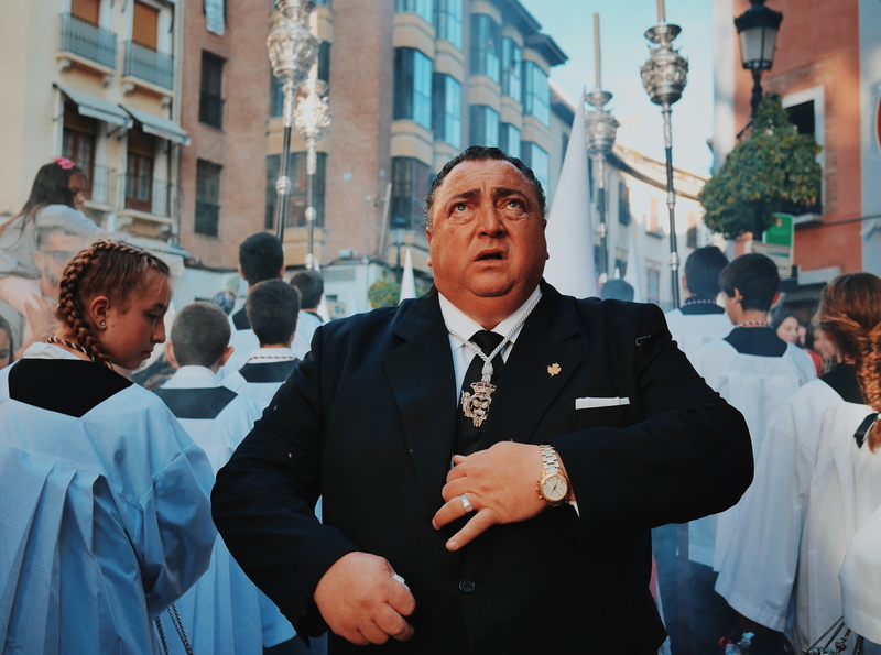 street, waist up, day, men, 4K, architecture, man, built structure, houses, males, suit, city, adult, people, incidental people, jacket, holy week, uniform