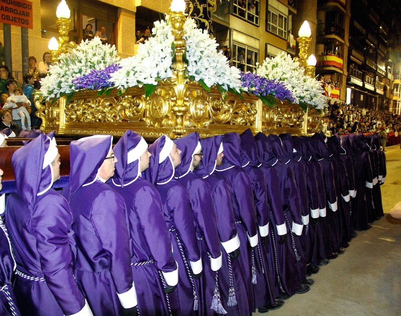 lorca, side by side, spirituality, built structure, purple, arrangement, 2K, large group of objects, uniform, celebration, outdoors, clothing, religion