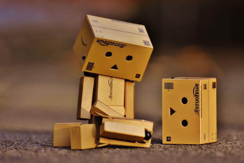 studio shot, humor, representation, wood - material, figure, danbo, group of objects, 5K, miss, gold colored, robot, close-up, toy, investment, fun, indoors