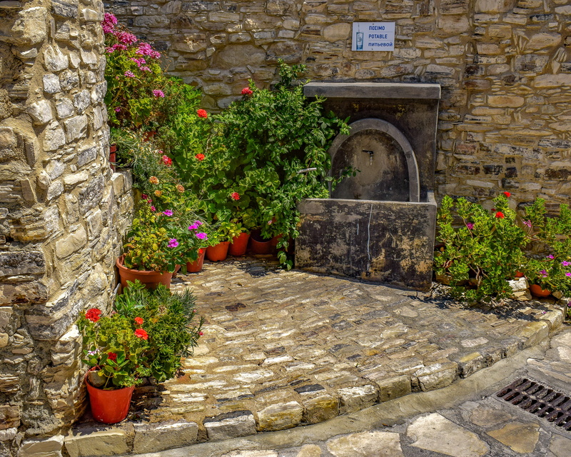 building, village, growth, flower pot, flower, fountain, no people, backstreet, wall, nature, potted plant, stone, cyprus, stone material, building exterior