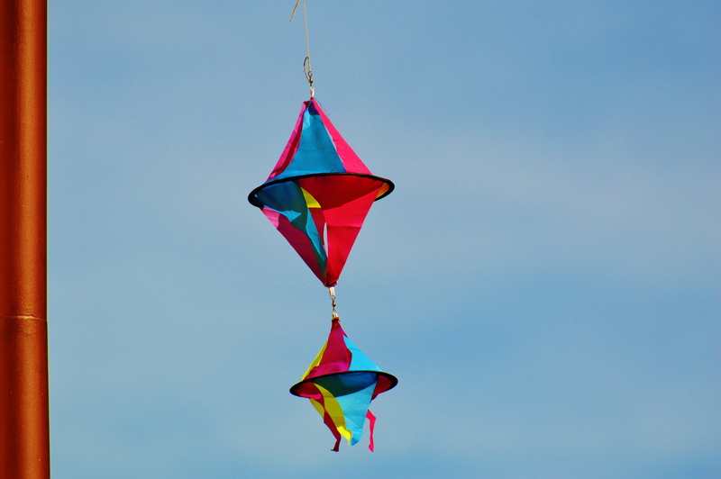 decoration, rotation, multi colored, turn, ease, slightly, rope, hanging, rainbow colors, kite - toy, nature, wind, mid-air, garden, gartendeko, sunny