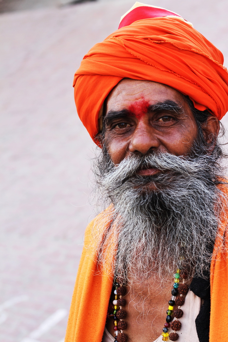clothing, standing, one person, outdoors, beside, wall, indian man, real people, taking, facial hair, males, turban, senior adult, looking at camera, men