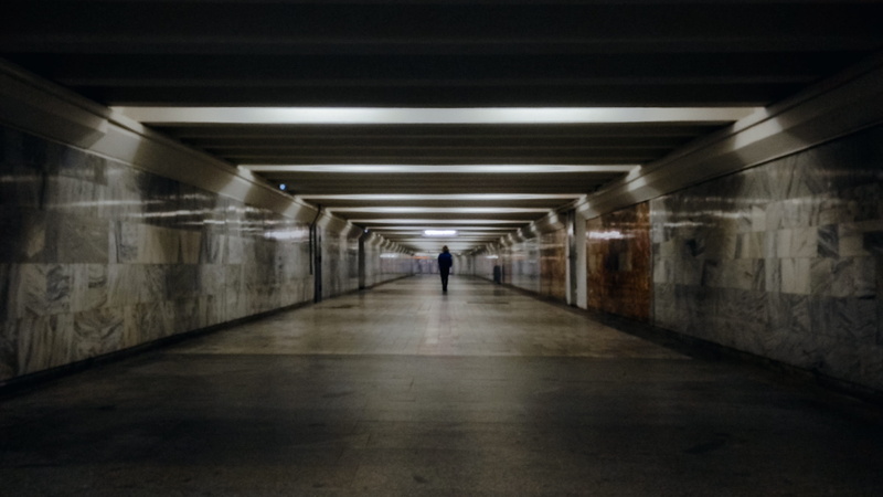 subway, person, illuminated, underground walkway, built structure, indoors, tunnel, transportation, wall, perspective, light at the end of the tunnel, building