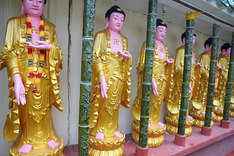 art, religion, woman, rock, architectural, faith, god, ornament, cosmetics, travel, male likeness, buddha, retail display, built structure, no people, gold