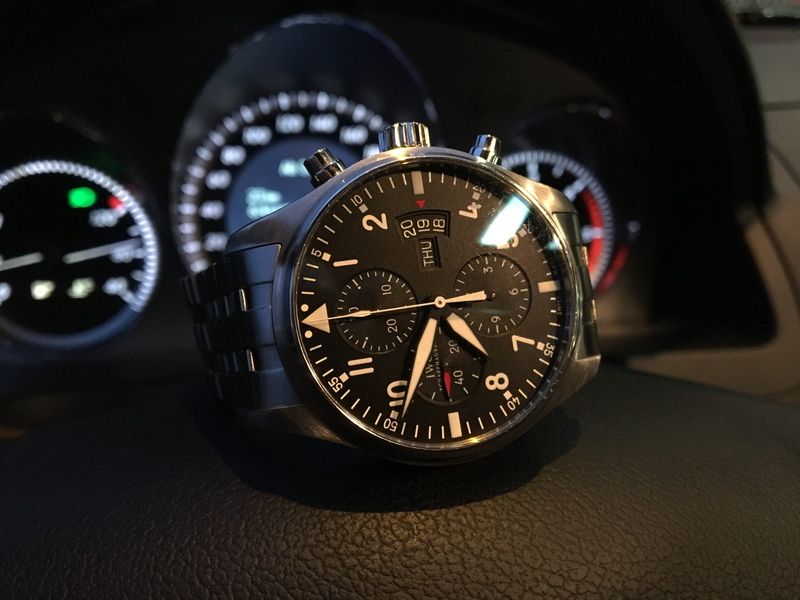 technology, silver colored, luxury, pilot watch, dial, no people, speed, iwc, indoors, mercedes, number, chrome, black background, watch, wristwatch, transportation