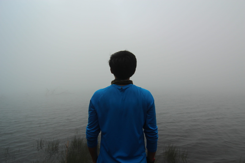 vacations, outdoors, men, looking at view, sea, standing, 5K, tranquility, real people, nike, misty, water, people, leisure activity, three quarter length