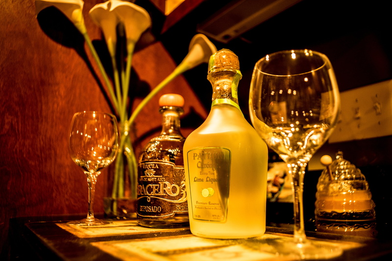 drinking glass, table, bottle, colorful, bar, alcoholic, no people, still life, glasses, margarita, container, tequila, bottles, taste, beside, luxury