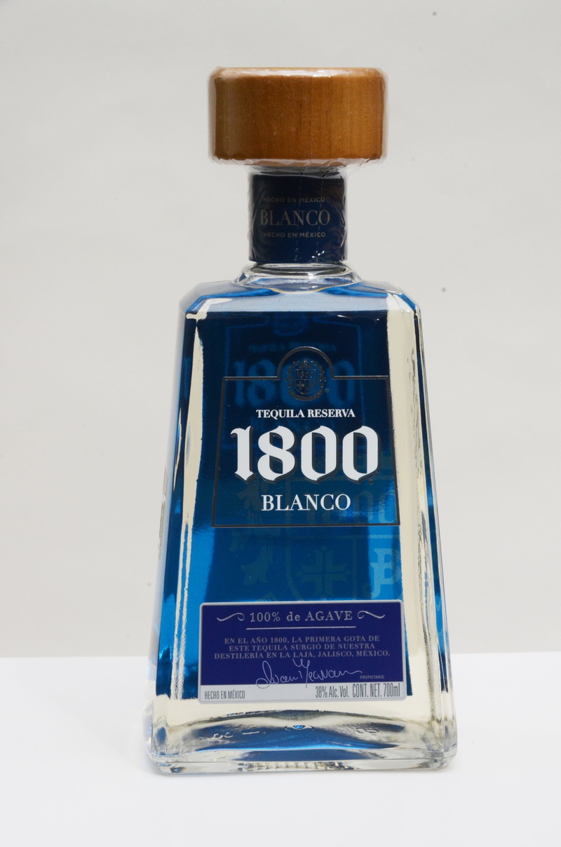 alcohol, information, premium tequila, glass - material, bottle, communication, transparent, tequila 1800, white tequila, western script, text, blue, number