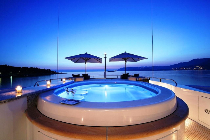 river, water, umbrella, sky, scenics - nature, modern, travel destinations, architecture, trip, infinity pool, wealth, illuminated, dusk, sea, nature, cocktails