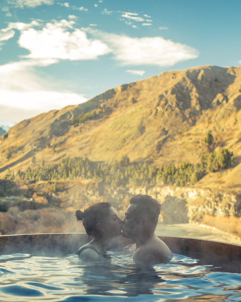 smoke, woman, scenics - nature, idyllic, two animals, love, valley, clouds, relaxation, pool, mountain, outdoors, recreation, daylight, vertebrate, kiss