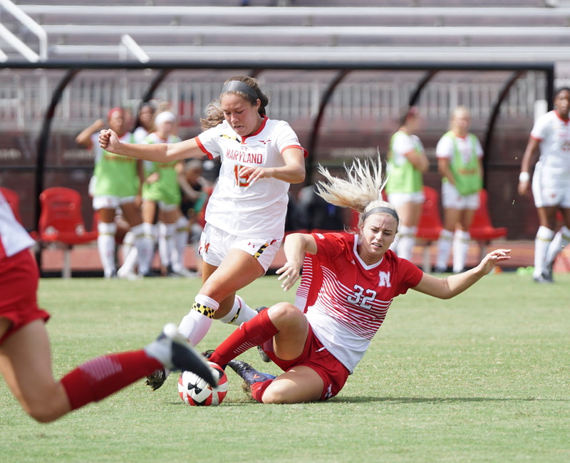 sports team, sports uniform, playing, grass, real people, people, group of people, terps, focus on foreground, 2K, teenager, maryland, athlete, competitive sport