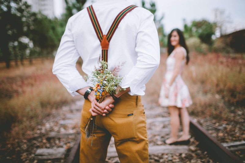 plant, women, real people, flower, adult, girl, casual clothing, marriage proposal, romantic, recreation, standing, date, young adult, landscape, blur