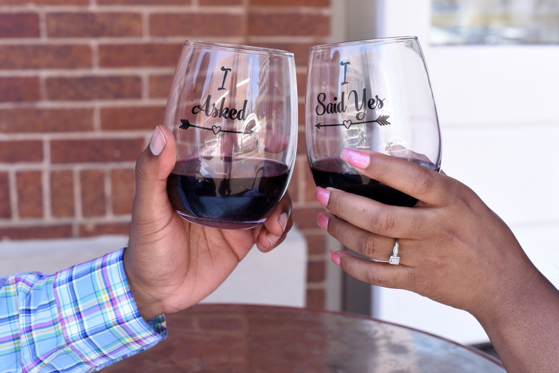 women, black, wall, drink, leisure activity, refreshment, couple, food and drink, adult, cup, finger, restaurant, celebration, toast, brick wall, glass