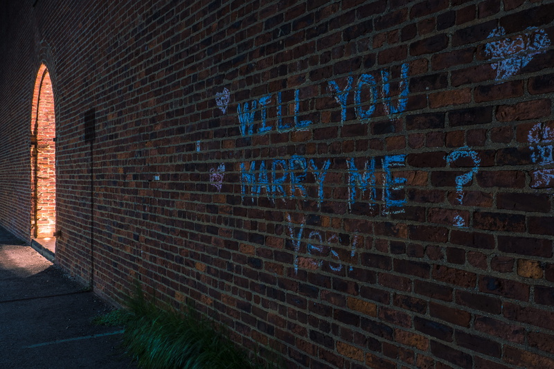 building exterior, graffiti, brick, architecture, illuminated, brick wall, wall, sign, creativity, night, nyc, no people, marriage, western script, message