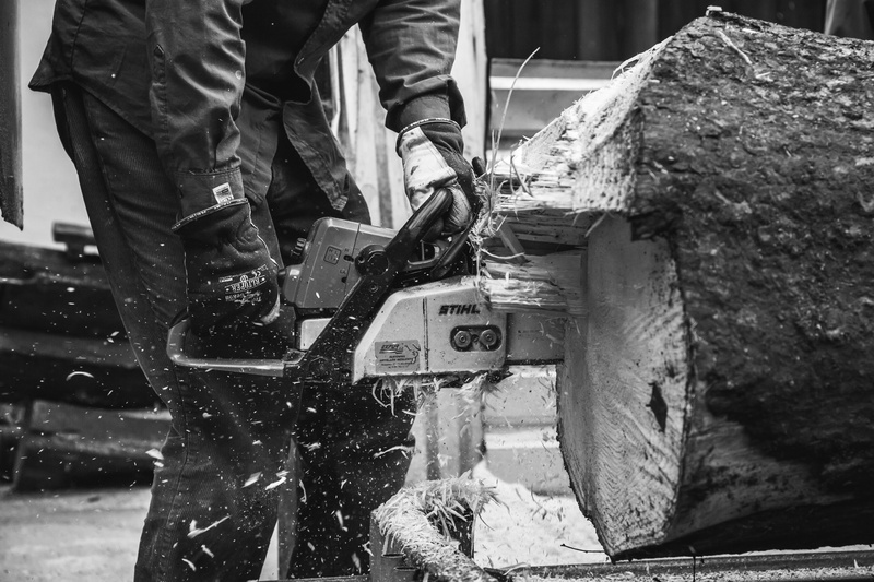 wood, chainsaw, black and white, one person, holding, low section, log, young adult, photo, person, 4K, nature, man, human foot, midsection, adults only
