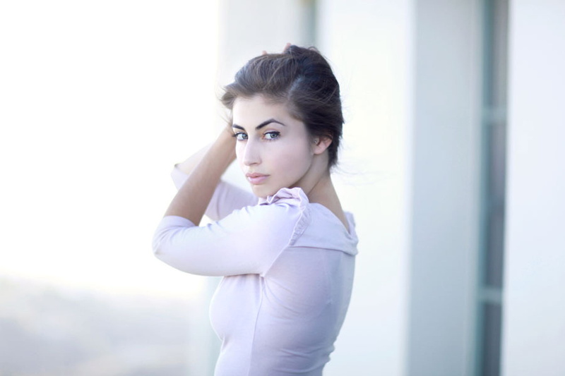 side view, model, brunette, focus on foreground, long hair, standing, contemplation, beauty, human arm, brown hair, celebrity, women outdoors, 720P, Dilan Gwyn