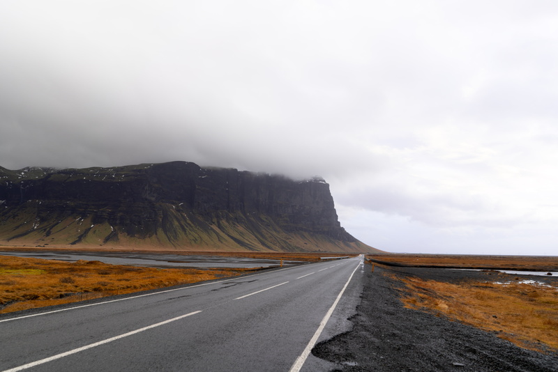 road marking, highway, the way forward, rock - object, cloudy, tar, day, asphalt, non-urban scene, diminishing perspective, plateau, outdoors, mesa, street