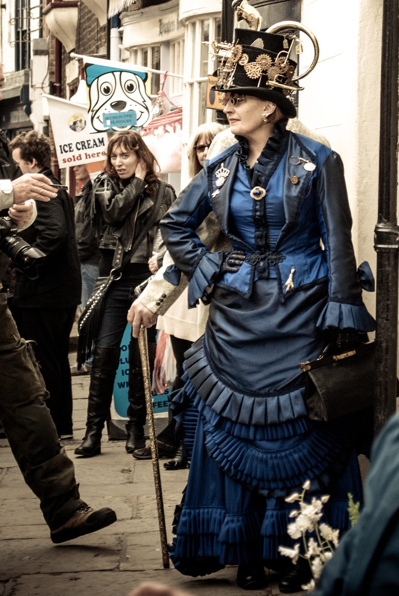 adult, architecture, women, real people, young adult, wearing, black, clothing, lifestyles, sleeved, standing, trumpet, group of people, gothic, front view