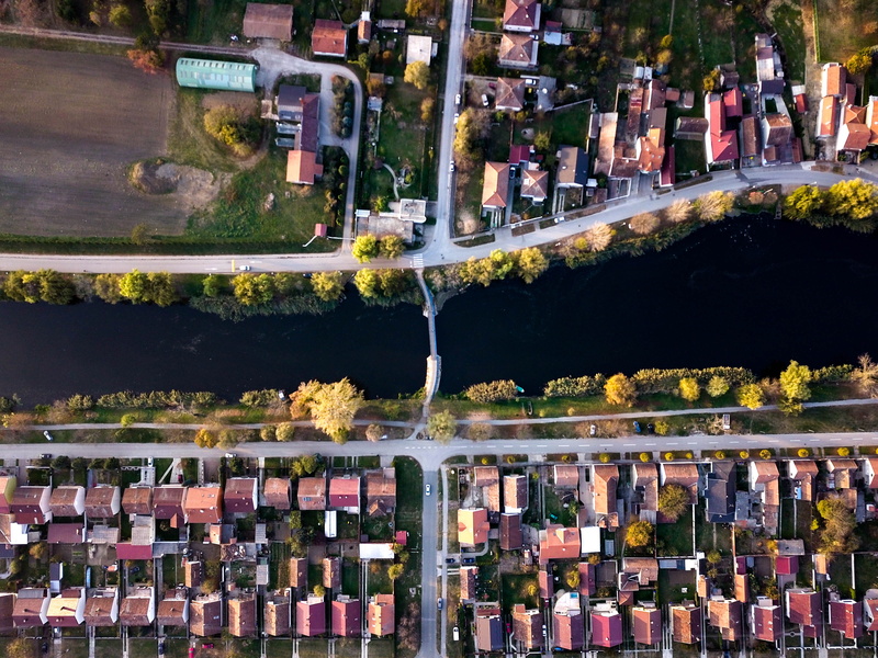 houses, buildings, cityscape, birds eye view, car, outdoors, city, motor vehicle, aerial view, residential district, architecture, drone photography, view