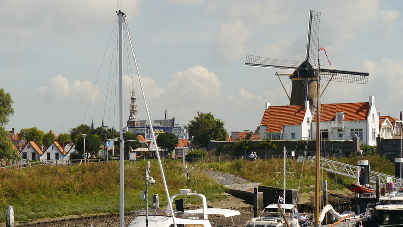 marina, building, real people, renewable energy, group of people, fuel and power generation, wind mill, 4K, outdoors, building exterior, environmental conservation