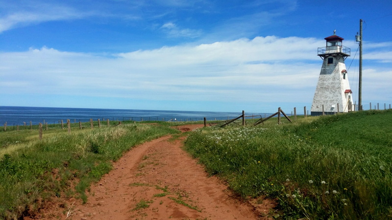 architecture, built structure, lighthouse, water, nature, footpath, no people, building exterior, red sand, horizon over water, prince edouard island, the way forward