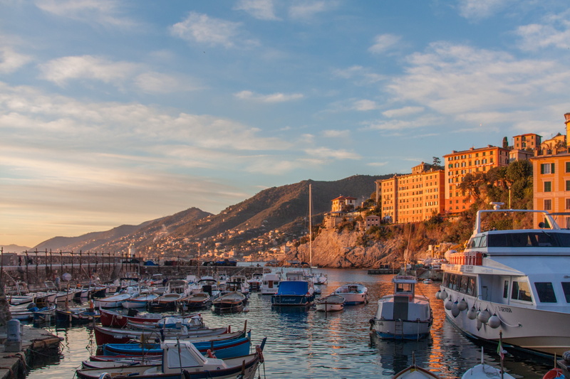 yachts, moored, nautical vessel, building exterior, residential district, sunset, ship, mode of transportation, pier, city, ocean, outdoors, marine, harbour