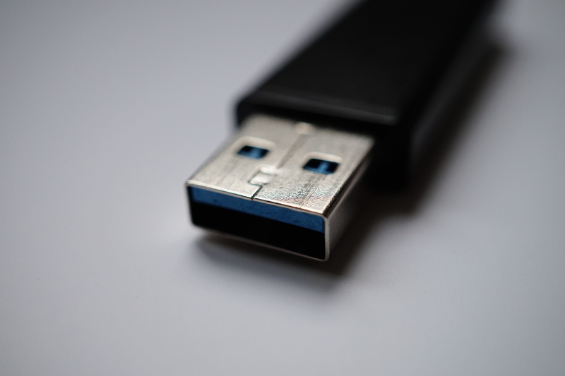 indoors, computer cable, stick, colored background, gray, electrical equipment, memory pen, wireless technology, close-up, studio shot, storage medium