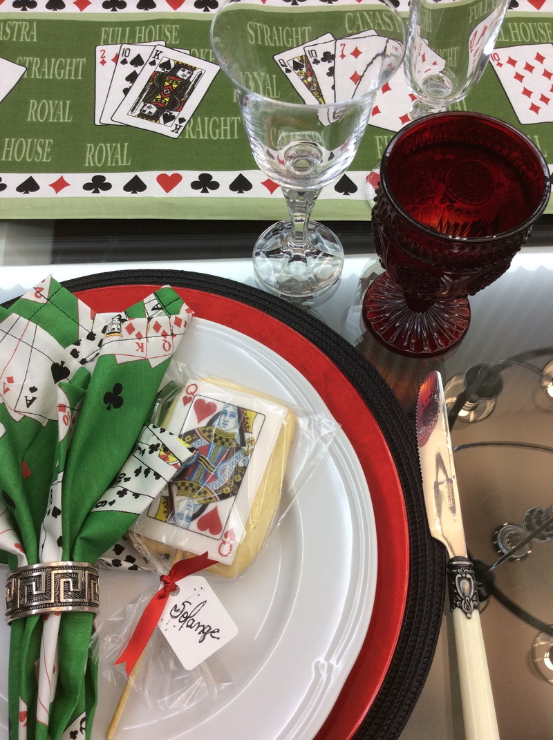 indoors, desk tidy, plate, setting, alcohol, sousplat, game, napkin, joker, red wine, food, wildcard, household equipment, data, casino, high angle view