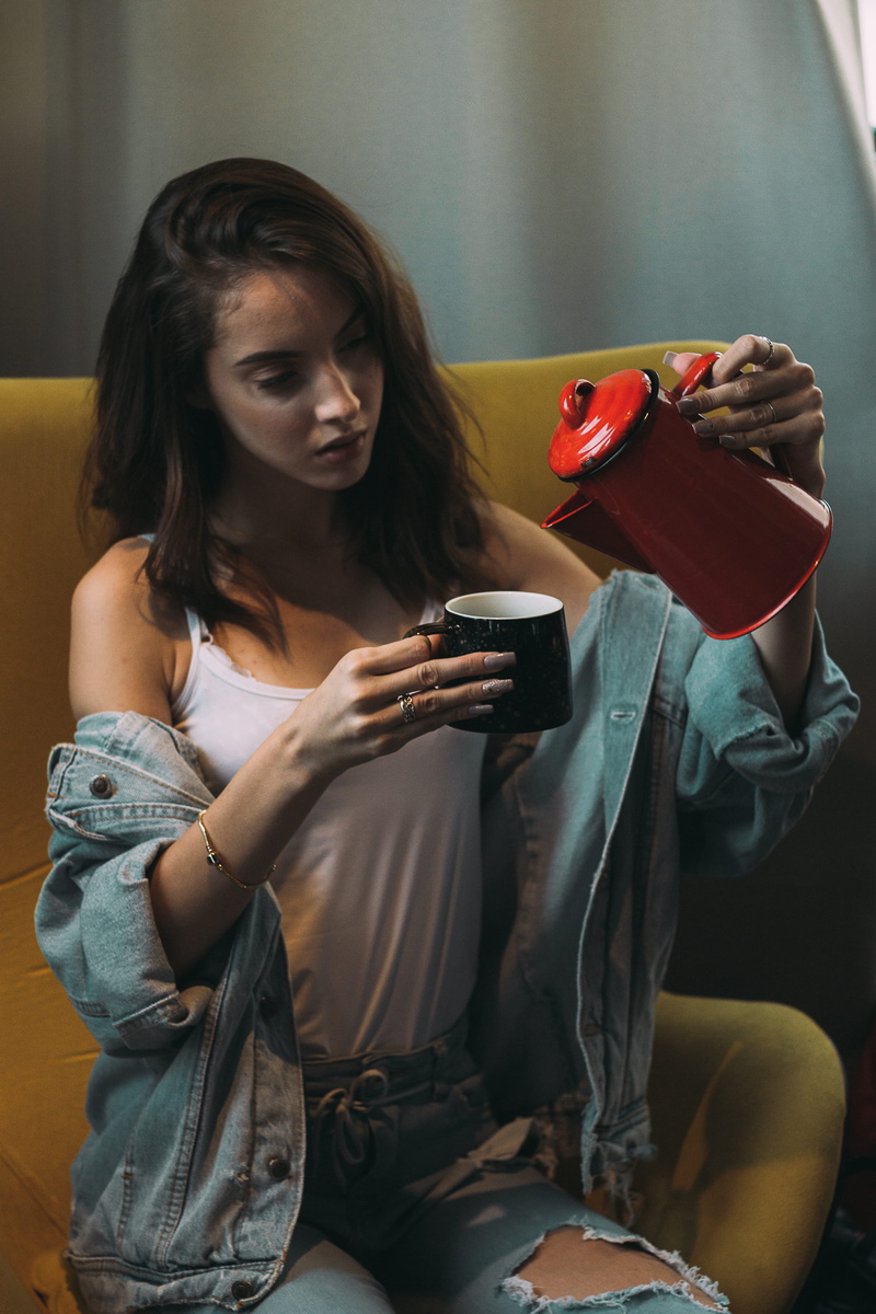 teeth, coffee shop, beverage, leisure, coffee, portable information device, denim jacket, telephone, portrait, laugh, wireless technology, mobile phone