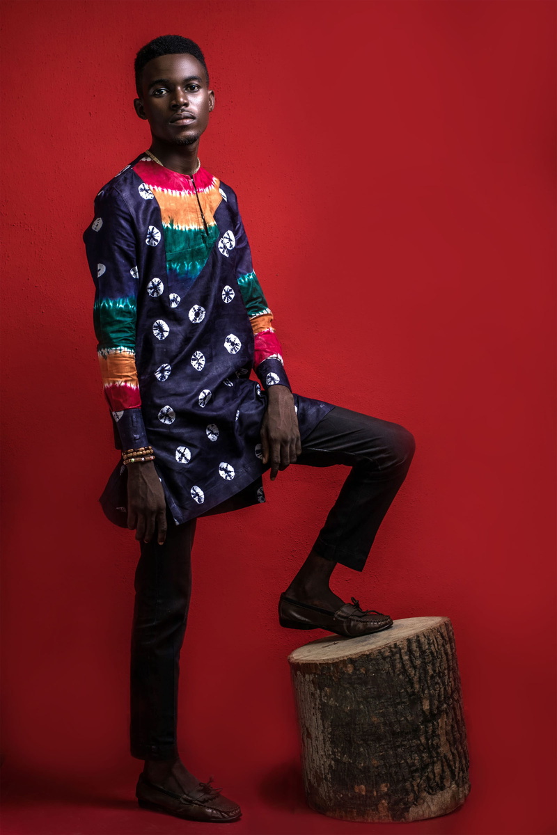 studio shot, looking at camera, african, adult, costume, 5K, model, pose, one person, front view, traditional, prints, black, afican, black skin, red
