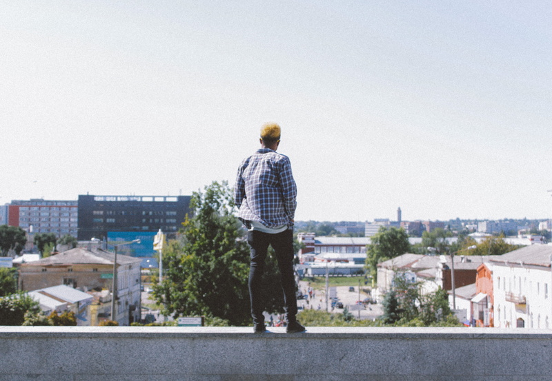 man, nature, nigerian, hero, real people, men, city, looking at view, youth, casual clothing, background, sky, clear sky, lifestyles, viewpoint