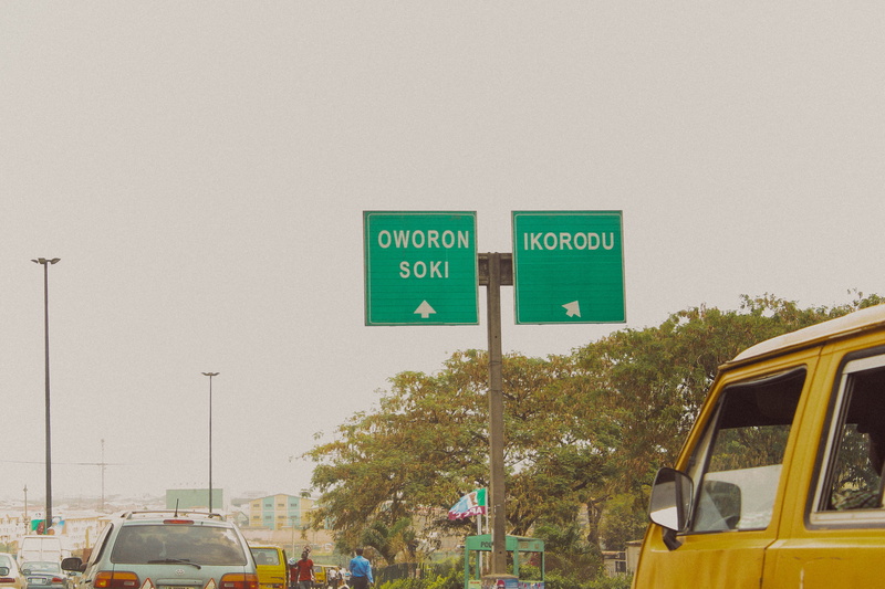 nature, city, sign, car, nigeria, motor vehicle, copy space, background, text, ikorodu, tree, bus, green color, day, mode of transportation, communication