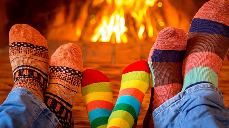 people, sock, fire - natural phenomenon, adult, casual clothing, happy, fireplace, choice, textile, happy family, vibrant color, legs, human body part