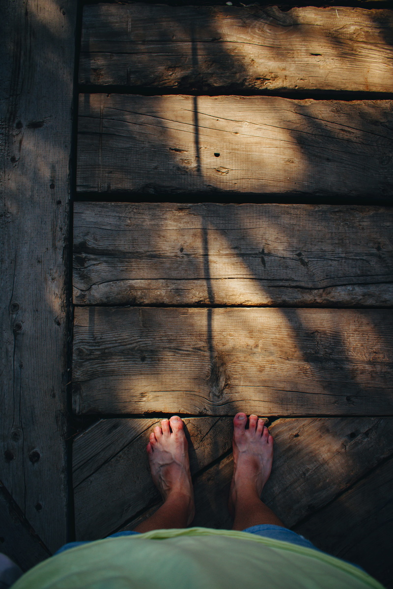 low section, body part, barefoot, feet, high angle view, standing, indoors, wooden floor, wooden, wooden bridge, human foot, women, directly above, human leg