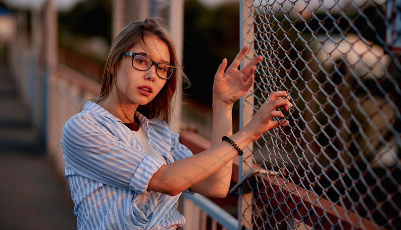 portrait, fence, women with glasses, brunette, standing, young women, young adult, one person, shirt, glasses, hair, beautiful woman, hairstyle, barrier