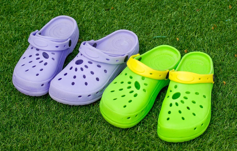 field, shoes, land, high angle view, pair, 4K, shoe, grass, plant, crocs, sandals, outdoors, multi colored, side by side, choice, day, nature, medium group of objects
