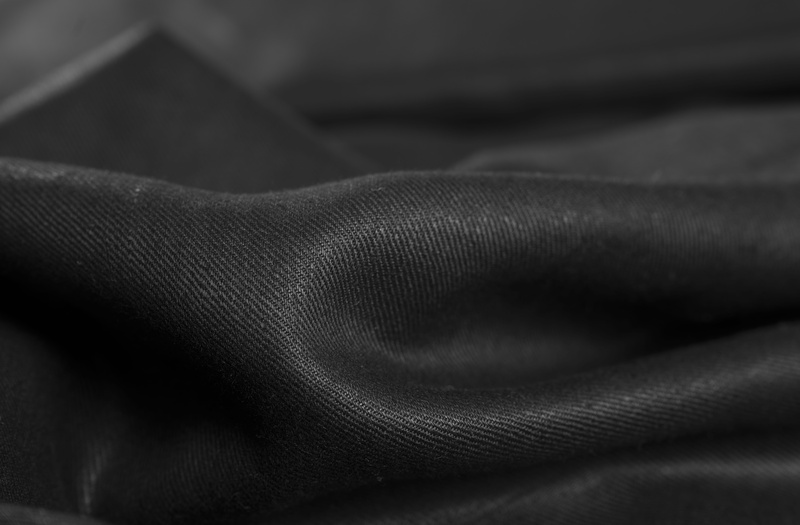 limb, indoors, wool, texture, one person, hand, insect, leather, cylinder, human body part, softness, backgrounds, cricket insect, black color, human limb