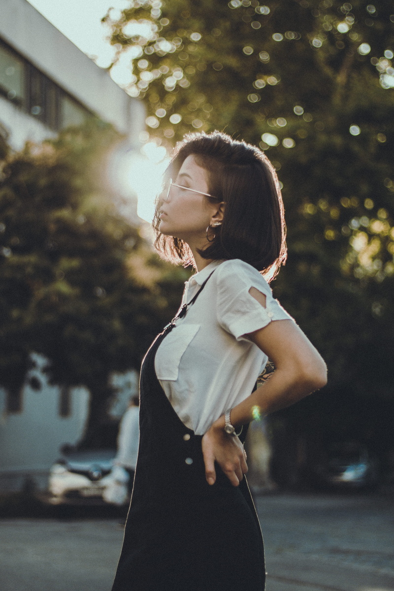 beautiful woman, tree, hair, flare, leisure activity, young adult, day, apparel, hairstyle, girl, sleeve, real people, footwear, looking, person, suit