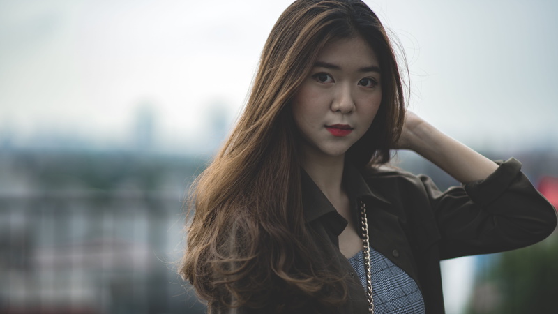 photography, hypebae, day, apparel, human, youth, looking, standing, headshot, photo, front view, portrait, woman, long hair, contemplation, coat, hairstyle