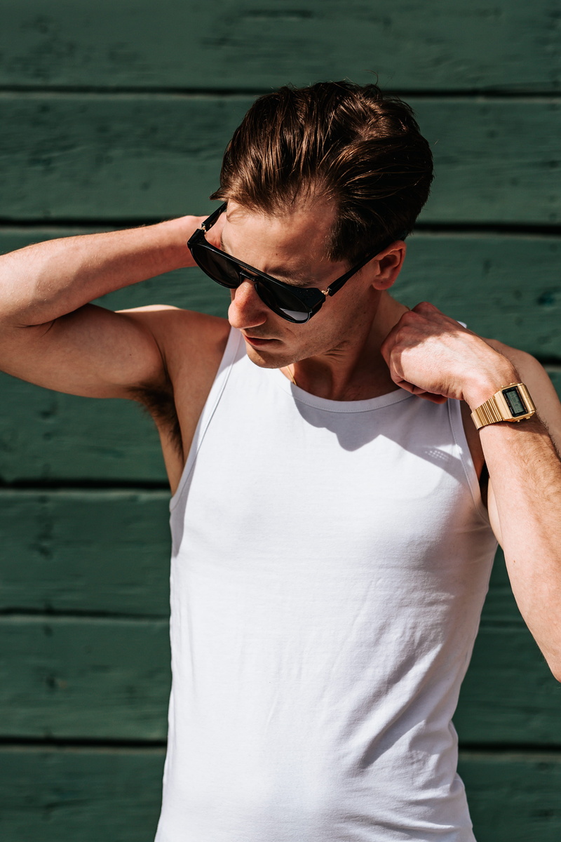 hairstyle, outdoors, standing, young men, leisure activity, tanktop, tank, eyeglasses, water, day, real people, wearing, shoulder, watch, lifestyles, person