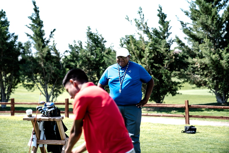 activity, leisure activity, tree, man, golf club, adult, plant, trees, casual clothing, recreation, waist, nature, fun, daylight, lawn, leisure, young adult
