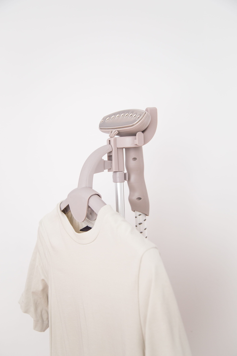 white, white color, crew, indoors, hanger, male likeness, hanging, iron, clothing, white background, fashion, representation, shirt, no people, cut out