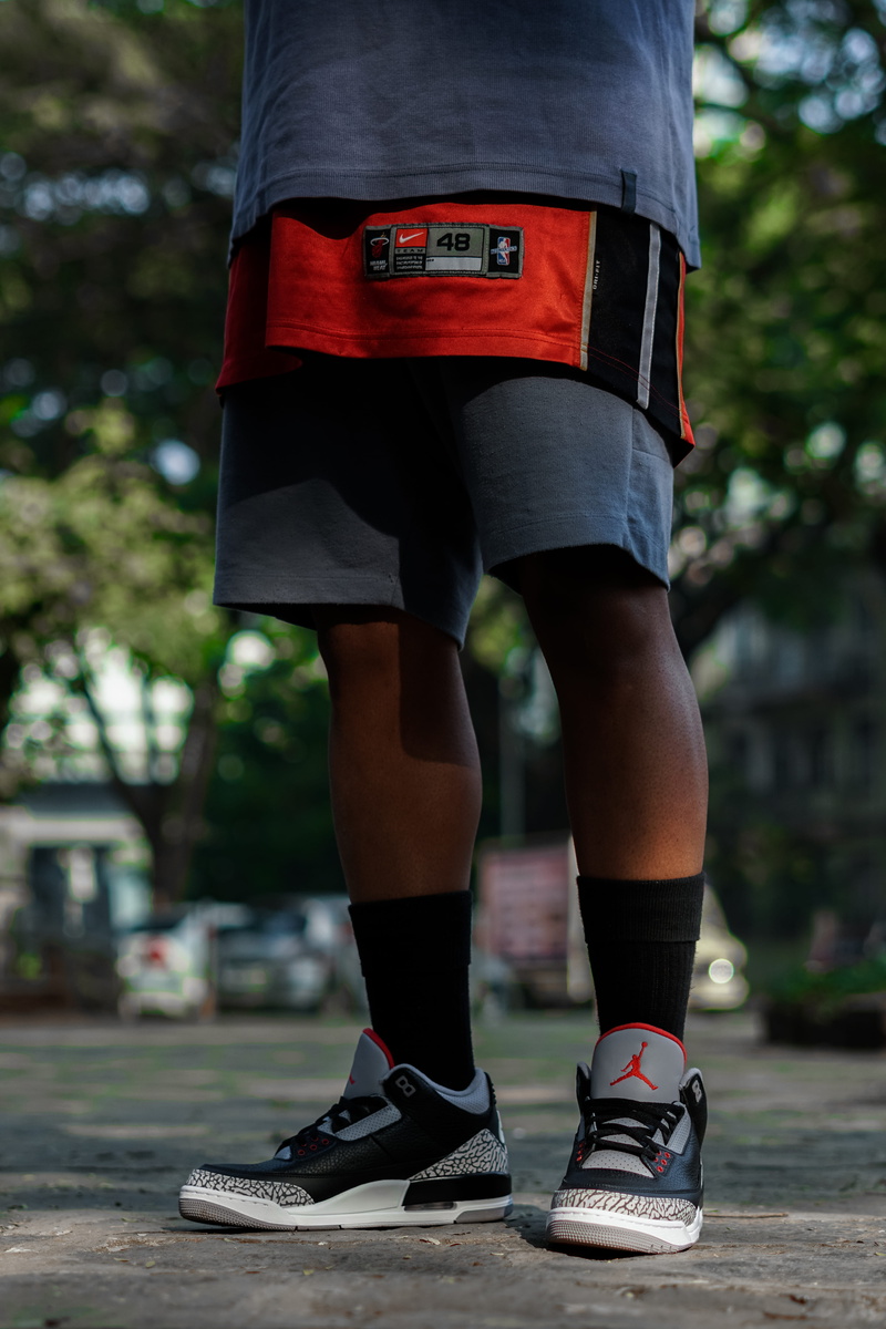 air, shoe, focus on foreground, human foot, cement, day, outdoors, standing, sock, rear view, low section, human leg, s, city, jordan, 5K, street, lifestyles