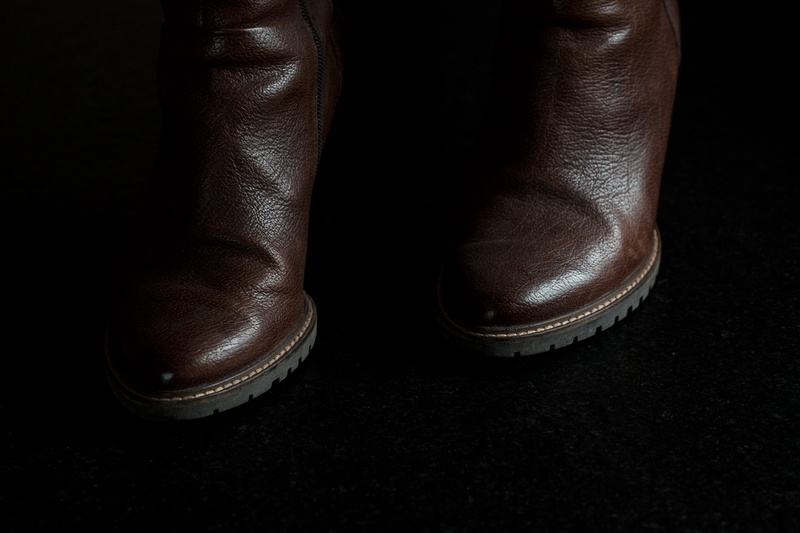blossom, boots, animal body part, black color, light, treasure flower, studio shot, limb, building, human limb, lifestyles, relaxation, low section, human body part