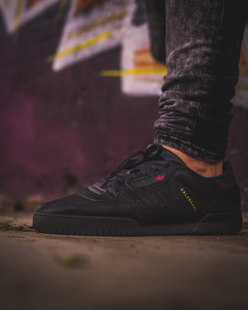 footwear, foot wear, person, day, adidas, selective focus, sneaker, utrecht, graffiti, surface level, black, sport, shoe, human foot, human limb, standing