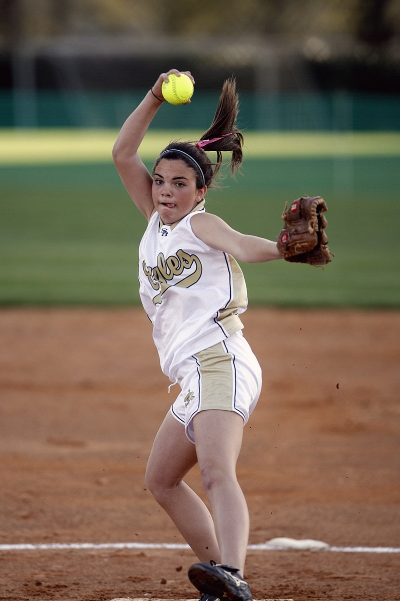 full length, sport, youth, ballgame, teenager, playing, pitcher, motion, field, glove, focus on foreground, game, throwing, play, land, day, real people