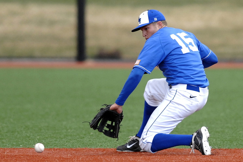playing, baseball, males, sport, lifestyles, motion, boys, infield, sports uniform, sports activity, college, game, child, adolescence, player, ground ball