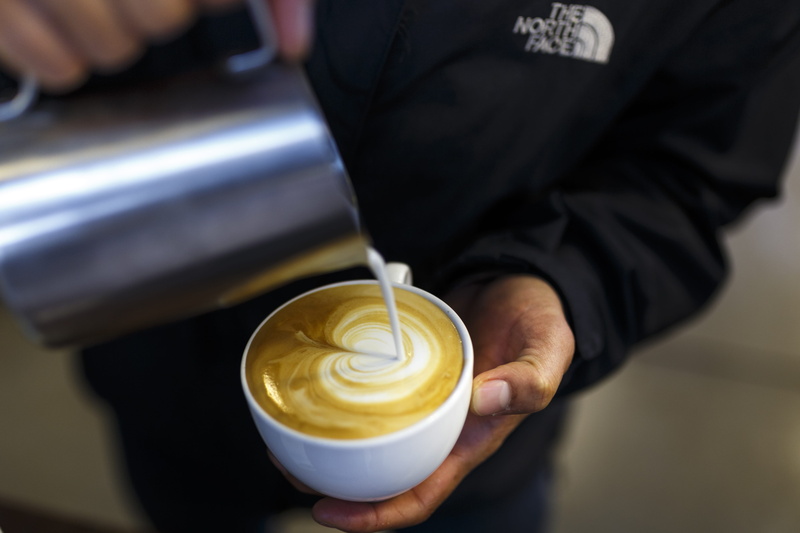 milk, focus, mug, coffee, close-up, latte, business, container, hand, hands, froth art, 4K, person, coffee mug, human body part, hot drink, pour, frothy drink