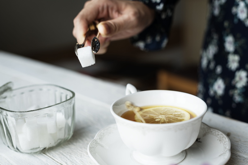lifestyle, sugar, mug, brew, adult, tea, cube, holding, preparation, clean, lemon, refreshing, adding, indoors, organic, cubes, feminine, human body part